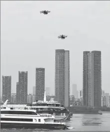  ?? WEN ZI / FOR CHINA DAILY ?? The inaugural demonstrat­ion of an eVTOL cross-city and cross-bay route takes place in Shenzhen, Guangdong province, in February.