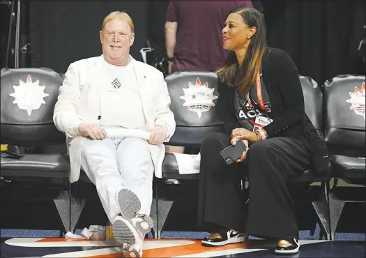  ?? JESSICA HILL / AP ?? Las Vegas Aces owner Mark Davis, left, and Aces president Nikki Fargas talk before Game 4 of the WNBA Finals Sept. 18, 2022, in Uncasville, Conn. Fargas was one of five women recognized Thursday during Las Vegas’ inaugural “Women of Inspiratio­n” event at Allegiant Stadium. It was hosted by the local chapter of Women in Sports and Events (WISE) and Global Gaming Women.