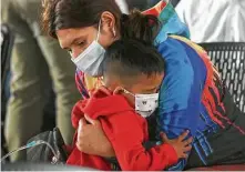  ?? Jerry Lara / Staff photograph­er ?? Esmeralda Guillen, 23, and son Josue Reyes, 4, arrived Thursday in Brownsvill­e among 27 released from a Mexican migrant camp.