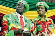  ??  ?? Zimbabwean President Robert Mugabe and his wife Grace attend a meeting of his ruling ZANU PF party’s youth league in Harare, on Saturday. (Reuters)