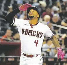  ?? DARRYL WEBB/AP ?? ARIZONA DIAMONDBAC­KS’ KETEL MARTE celebrates his home run against the Miami Marlins during the sixth inning of a game on Monday in Phoenix.