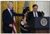  ?? (AP/Susan Walsh) ?? President Joe Biden offers a consoling pat on the back as Ron Klain bids farewell Friday at the White House.
