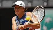  ?? ALESSANDRA TARANTINO/AP ?? Poland’s Iga Swiatek returns the ball to Turkey’s Ons Jabeur during their final match at the Italian Open tennis tournament, in Rome, Sunday.