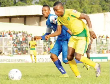  ??  ?? Josua Obaje (right) of Plateau United FC contest for the ball with Nfeanyi Nweke of Rivers United during their league match at the Rwang Pam Stadium in Jos last season