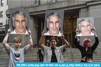  ??  ?? NEW YORK: A protest group called ‘Hot Mess’ hold up signs of Jeffrey Epstein in front of the Federal courthouse in New York City. Two more women have filed a $100 million lawsuit against the estate of Jeffrey Epstein, accusing the tycoon of having sexually abused them 15 years ago. —AFP