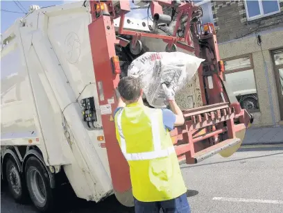  ??  ?? The council has a zero-tolerance approach to waste offences – and has fined residents for mixing recyling with other items