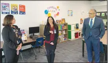  ?? HILLARY DAVIS ?? Cindy Flores, Family Support Center director; CCSD Family Engagement Director Denise Diaz; and Superinten­dent Jesus Jara talk at the Clark County School District’s new Family Support Center, which opened about a month ago.