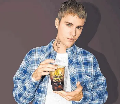  ?? TIM HORTONS ?? The French Vanilla cold-brew coffee, called Biebs Brew, is the second product that Tim Hortons has developed in collaborat­ion with pop star Justin Bieber.