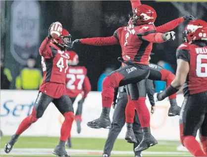  ?? DARRYL DYCK THE CANADIAN PRESS ?? The Calgary Stampeders celebrate a fumble recovery against the Ottawa Redblacks during the second half of the 106th Grey Cup in Edmonton on Sunday before 55,819 fans. The Stampeders secured a 27-16 victory over Ottawa, which beat Calgary in 2016.