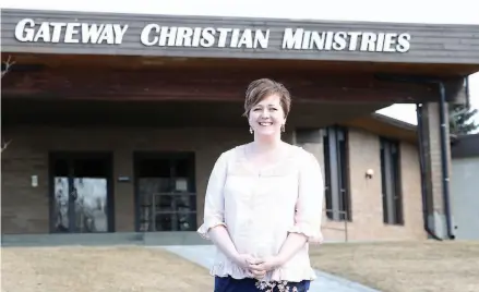  ?? CITIZEN PHOTO BY JAMES DOYLE ?? Associate Pastor Kimi Orton stands in front of Gateway Christian Ministries last week. Church members are doing a community outreach program where they are asking those low income residents who have a project they need done to come forward with their...