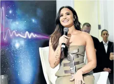  ?? MIKE COPPOLA/GETTY IMAGES ?? Demi Lovato answered questions during the DEMI x JBL Tell Me You Love Me Pop Up event, celebratin­g her new album and partnershi­p with JBL. The album listening party was held on Sept. 28, at the Highline Gallery in New York City.