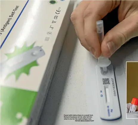  ?? ?? Faced with instructio­ns in a small font, Richard Swainson let his wife tell him what to do for his rapid antigen test.
PETER MEECHAM/STUFF