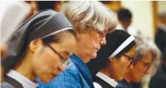  ?? (Max Rossi/Reuters) ?? SISTER SALLY Hodgdon takes part in a synod session led by Pope Francis at the Vatican last week.