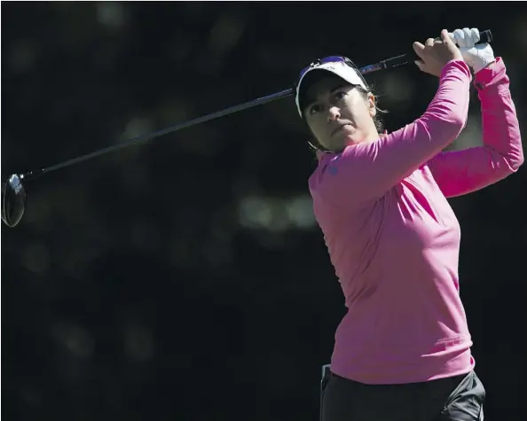  ?? ADRIAN WYLD/THE CANADIAN PRESS ?? Marina Alex is the first-round leader after shooting 66 at the Canadian Pacific Women’s Open in Ottawa Thursday.