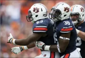  ?? ALBERT CESARE — THE ASSOCIATED PRESS ?? Auburn running back Kamryn Pettway (36) is expected to play Saturday against topranked Alabama.