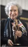  ?? AFP ?? CANADIAN author Margaret Atwood poses with the Franz Kafka Award for 2017, in Prague on Oct. 17.