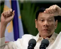  ?? Reuters ?? Rodrigo Duterte gestures while answering questions during a news conference upon arrival from a trip to Myanmar and Thailand at an internatio­nal airport in Manila. —