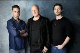  ?? PHOTO BY TAYLOR JEWELL — INVISION — AP, FILE ?? In this file photo, Wade Robson, from left, director Dan Reed and James Safechuck pose for a portrait to promote the film “Leaving Neverland” at the Salesforce Music Lodge during the Sundance Film Festival in Park City, Utah.