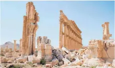  ?? FOTO: DPA ?? Die einzigarti­gen Bauwerke Palmyras wurden nach dem ersten Einmarsch des IS schwer beschädigt. Nun sind die Milizen zurück.