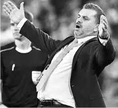  ?? — AFP photo ?? Australia coach Ange Postecoglo­u reacts during their 2018 World Cup qualifying match against Syria in Sydney in this Oct 10 file photo.