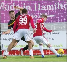  ??  ?? GRACE UNDER PRESSURE: Templeton delivers the late blow to Partick Thistle as Hamilton ended their long run of defeats