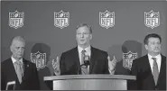  ?? Associated Press ?? Anthem policy: NFL commission­er Roger Goodell, center, is flanked by Pittsburgh Steelers president Art Rooney II, left, and Arizona Cardinals owner Michael Bidwill during a news conference where he announced that NFL team owners have reached agreement...