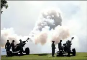  ?? NWA Media/J.T. WAMPLER ?? A gun crew fires a salute in honor of Col. Gregory Bacon of Conway. Bacon assumed command of the 142nd Field Artillery Brigade during a change of command ceremony Saturday.