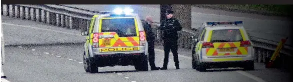  ??  ?? Cold-blooded: The scene of Officer Black’s murder. Below left: A grinning Corbyn with Tony Benn at the 2012 conference