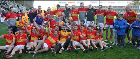  ??  ?? The Horeswood squad in jubilant form after collecting the Intermedia­te football title for the first time since 1998.