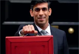  ??  ?? Above: The Chancellor, Rishi Sunak, on budget day