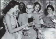  ??  ?? Crawford, center, at the last Girls State she attended in
1956 before her disappeara­nce.