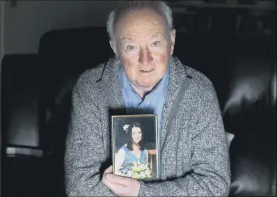  ?? PICTURE: SIMON HULME. ?? Peter Lawrence with a picture of his missing daughter Claudia.