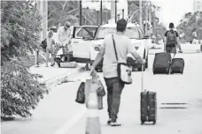  ?? JACK GRUBER, USA TODAY ?? Miami Beach was closed to car traffic a day after Irma struck. The resort city was expected to allow residents back today.