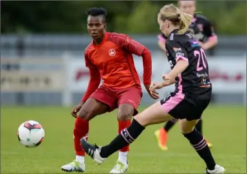  ??  ?? Annette Jacky Messomo of BIIK-Kazygurt taking on Maria Delahunty of Wexford Youths.