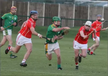  ??  ?? Fethard wing-back Joe Sutton attempts to cut out this handpass in their AIB All-Ireland Club Junior hurling quarter-final victory in Ruislip on Saturday.