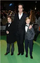  ?? ?? Nick Cave with twin sons Arthur and Earl in 2012 Jon Furniss/Jon Furniss/Invision/AP