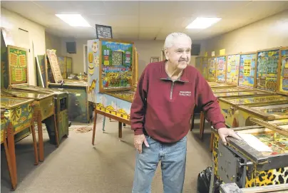  ?? JACQUELINE DORMER/AP PHOTOS ?? Butch Glauda, of Pottsville, talks about his bingo pinball machines.