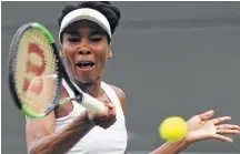  ?? Tim Ireland / Associated Press ?? Venus Williams handles the on-court portion of her day with relative ease, especially compared with the post-match discussion of her involvemen­t in a recent auto accident in which a man died.