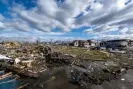  ?? Photograph: Doug McSchooler/AP ?? A late-night tornado destroyed Sullivan, Indiana, on 1 April, causing multiple deaths.