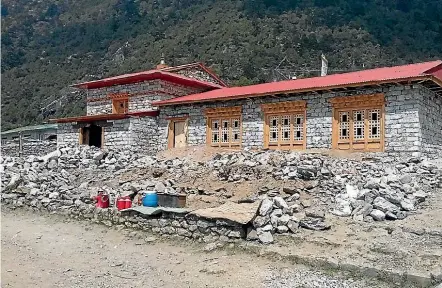  ?? PHOTO: SUPPLIED ?? The rebuilt community centre, The Mani Lhang, in Khunde, which was destroyed in the October 2015 earthquake­s. ‘‘Working at this altitude of 3853m was quite difficult, despite acclimatis­ation days on our trek in.’’