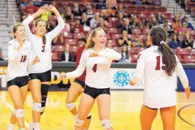  ?? COURTESY OF NEW MEXICO STATE ?? Cat Kelly (4) celebrates with her New Mexico State teammates after a victory at the Pan American Center in Las Cruces.