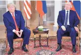  ?? ASSOCIATED PRESS ?? Donald Trump and Vladimir Putin in Helsinki