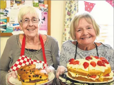  ?? Pictures: Alan Langley FM4934866 ?? Clair Chantler and Pam Uden on the cake stall at the World’s Biggest Coffee Morning event at Willesboro­ugh Women’s Institute Hall