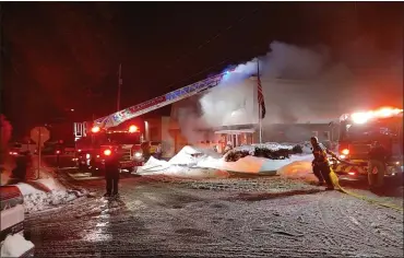  ?? COURTESY OF QUINN DICKINSON ?? Firefighte­rs on the scene of an ambulance that caught fire in the garage at Western Berks Ambulance Associatio­n, 2506 Belmont Ave. in Spring Township. Crew members of the associatio­n discovered the fire about 7p.m. Thursday, February 18, 2021.