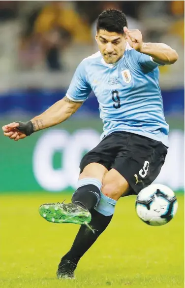  ?? Agence France-presse ?? Uruguay’s Luis Suarez scores against Ecuador during their Copa America group match in Belo Horizonte on Sunday.