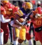  ?? ERIC HARTLINE – FOR DIGITAL FIRST MEDIA ?? Upper Darby’s Kareem McAdams, center, helped the Royals to a 7-5 record and second ranking in the county in rushing yards (1,377).