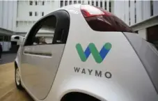  ?? ERIC RISBERG/THE ASSOCIATED PRESS FILE PHOTO ?? Waymo is starting a free driverless car service that will ferry people around Phoenix, Ariz. Employees will be behind the wheel in case of emergencie­s.