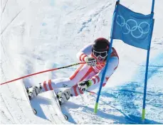  ?? FOTO: AFP ?? Name, Sturz, Gold – Matthias Mayer macht es wie der Herminator.