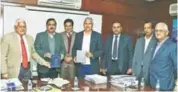  ??  ?? Shri Satish Chandra IAS Addl.Chief Secy.Power Punjab Govt.and Sh.A.Venu Prasad IAS Principal Secy.Local Bodies Govt.Punjab cum CMD PSPCL &PSTCL releasing the PSPCL Diary for the Year 2018 at Mohali here today, the Directors of PSPCL Sh.R.P.Pandove...