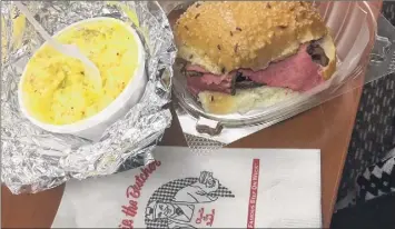  ??  ?? A beef on weck, a known Buffalo dish, from Charlie the Butcher.